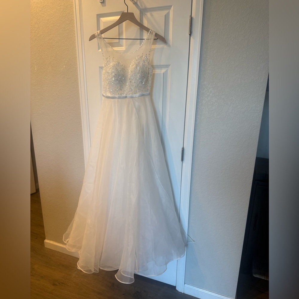 Ivory Beaded Tulle Wedding Gown with Sheer Neckline